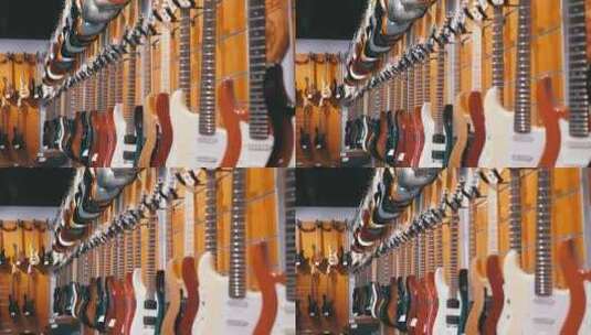 很多电吉他挂在音乐商店商店乐器高清在线视频素材下载