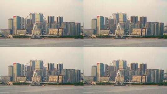 摩天轮转动滨海建筑深圳欢乐港湾高清在线视频素材下载