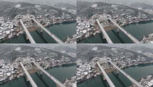 航拍城市跨河大桥交通雪景高清在线视频素材下载