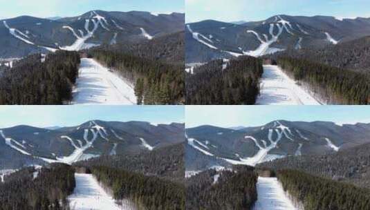 从空中俯瞰山地滑雪道高清在线视频素材下载