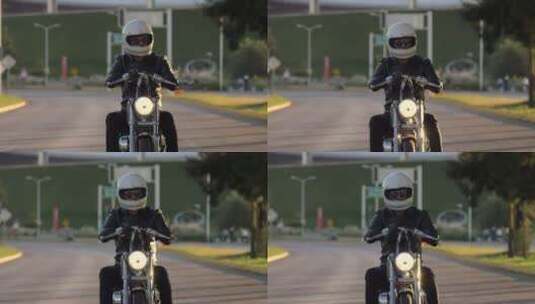 在偏僻的街道上驾驶摩托车的人高清在线视频素材下载