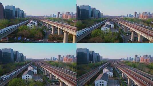 4K航拍行驶在城市中的高铁进站高清在线视频素材下载