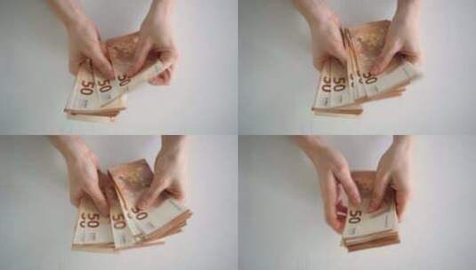 计算欧元钞票时女性的手部特写欧洲经济的价值高清在线视频素材下载