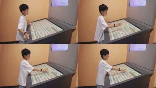 中国小男孩在博物馆参观学习高清在线视频素材下载