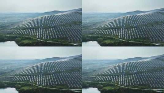 航拍山坡上的太阳能光伏发电站高清在线视频素材下载