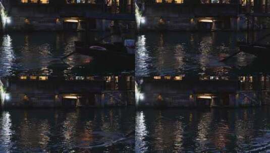 乌镇夜景乌篷船在河里前行的风光高清在线视频素材下载