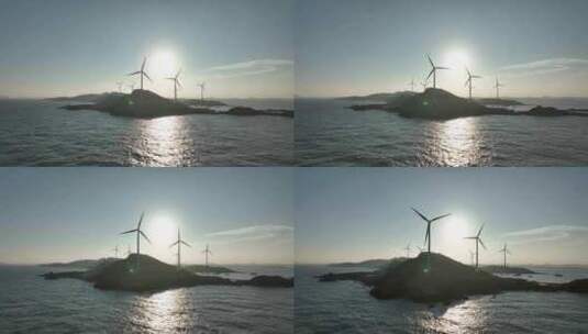 大海日出风车航拍海岛海上发电海洋风力发电高清在线视频素材下载