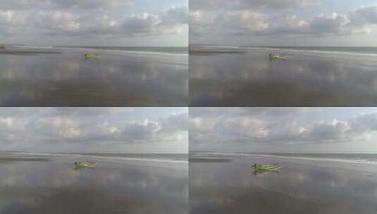 海滩上飞过的一艘远洋独木舟高清在线视频素材下载