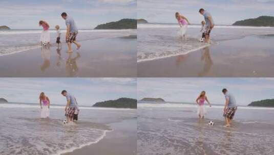 一家人在沙滩上开心的踢足球高清在线视频素材下载