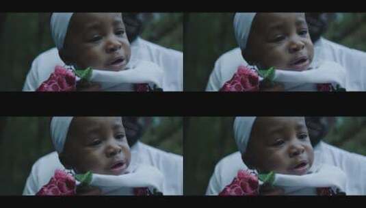 非洲黑人婴儿的洗礼高清在线视频素材下载