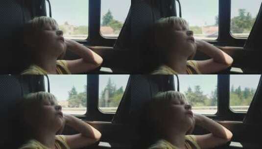 汽车后座睡着的女孩高清在线视频素材下载