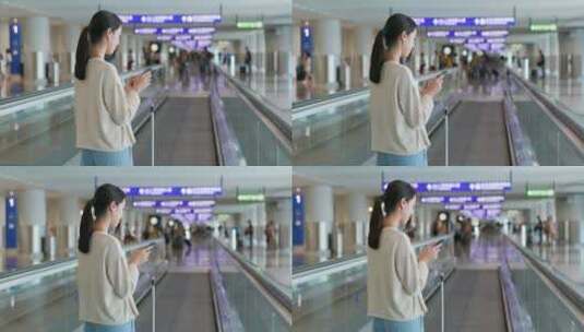 女孩在机场扶梯上使用手机高清在线视频素材下载