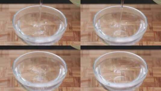 有机玻璃碗倒清水高清在线视频素材下载