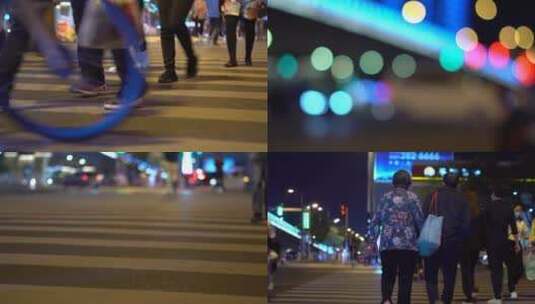 城市夜景红绿灯光斑闪烁行人车流过马路高清在线视频素材下载