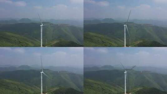 航拍高山上的风力发电机高清在线视频素材下载