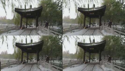 雪中的北京紫竹院公园内的亭子高清在线视频素材下载