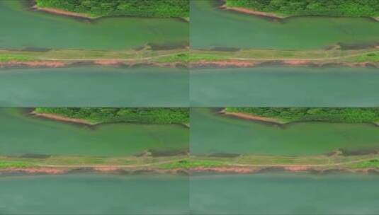 俯拍蓝色湖泊岛屿唯美竖屏高清在线视频素材下载