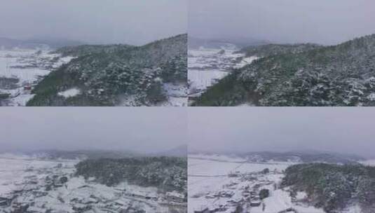 下雪的农村  被风雪覆盖的小村庄高清在线视频素材下载