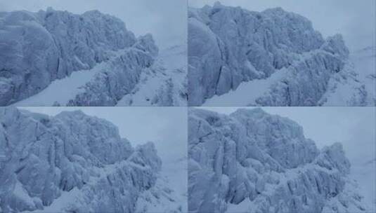 雪景中冬季山峰的鸟瞰图高清在线视频素材下载