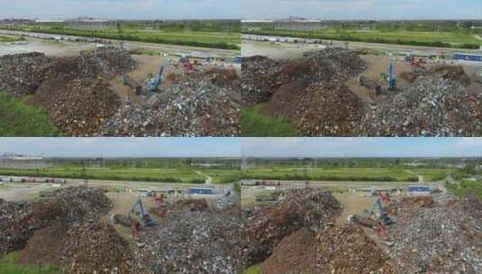 废金属回收废钢堆回用工业爪式起重机高清在线视频素材下载