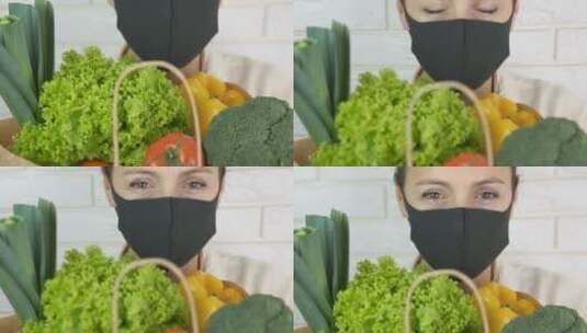 戴面具的女人拿着蔬菜高清在线视频素材下载