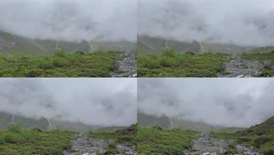 航拍四川甘孜磨西镇海螺沟高山草甸河谷风光高清在线视频素材下载