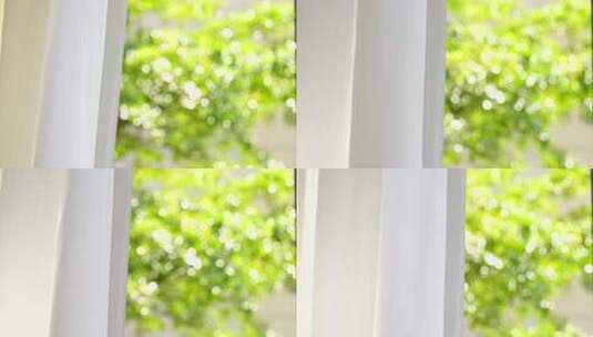 风吹窗帘窗户白色窗帘飘动阳光透过白色窗帘高清在线视频素材下载