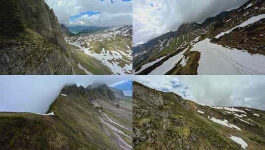 FPV无人机航拍高山山脉森林白雪蓝天白云高清在线视频素材下载