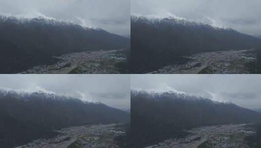 西藏林芝地区波密县城寺庙雪山高空航拍高清在线视频素材下载