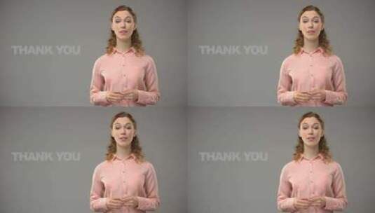 女人用手语说谢谢，背景文字，交流高清在线视频素材下载
