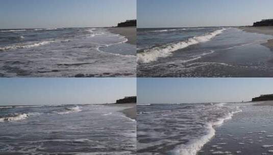 海浪冲击着空旷的海滩高清在线视频素材下载