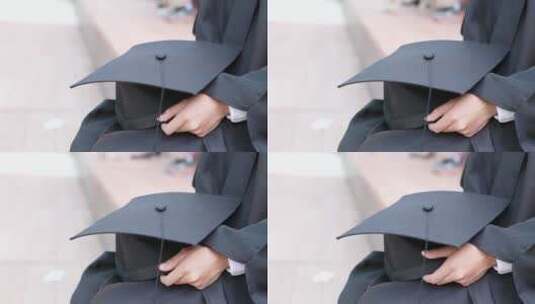 女生手里拿着毕业帽高清在线视频素材下载