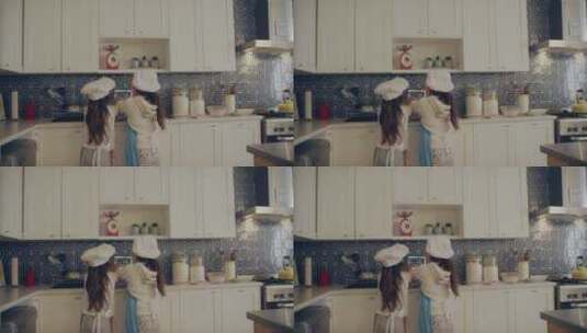 两个女孩在厨房洗手的背影高清在线视频素材下载