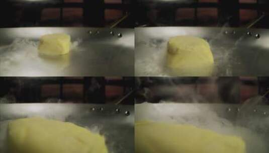 黄油在锅中滑动高清在线视频素材下载