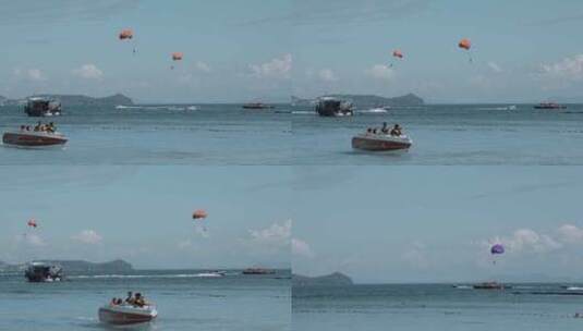 泰国旅游视频普吉岛蓝色海面上水上跳伞运动高清在线视频素材下载