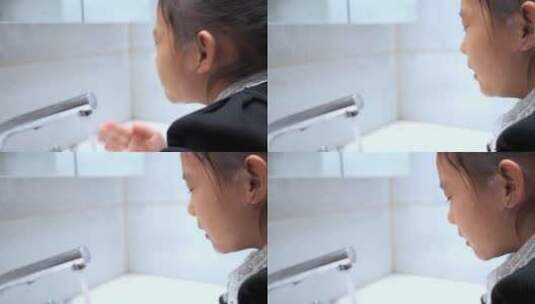 在卫生间洗脸的中国女孩高清在线视频素材下载