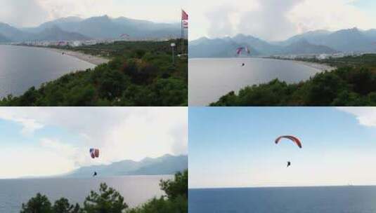 用滑翔伞向海滩滑翔高清在线视频素材下载