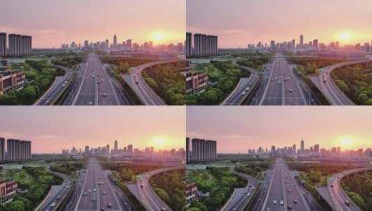 航拍夕阳下高架道路和江苏南通现代城市风光高清在线视频素材下载