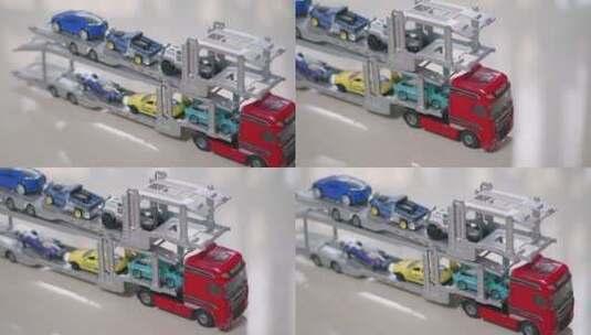 铝合金玩具拖车和它运载的玩具小汽车高清在线视频素材下载