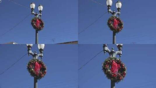 路灯杆上的圣诞花环放大高清在线视频素材下载