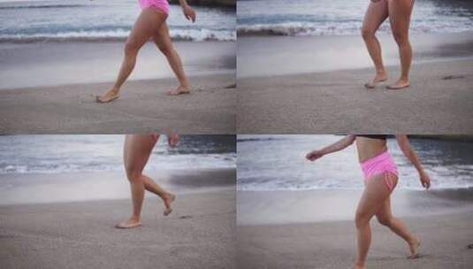 在海滩上散步的女人高清在线视频素材下载