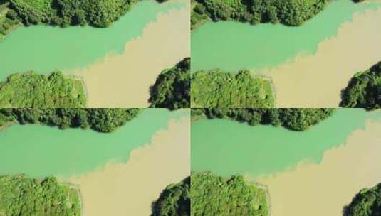 绿色江水和浑浊江水汇合处高清在线视频素材下载