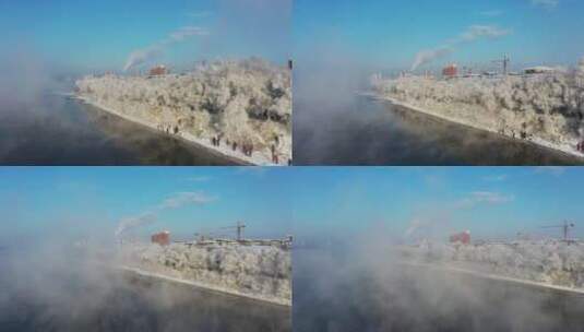 航拍吉林市松花江边的雾凇高清在线视频素材下载