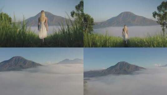 烟雾缭绕的山里，女孩在树林里走动高清在线视频素材下载