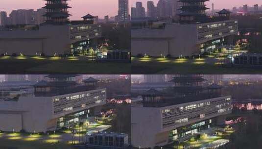 航拍中国扬州大运河博物馆大运塔夕阳夜景高清在线视频素材下载