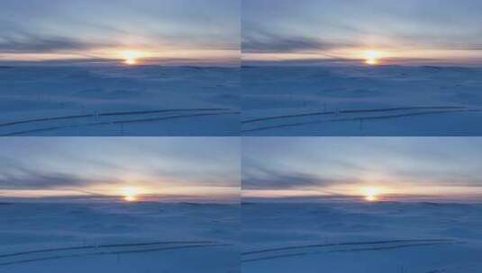 航拍冬日暮色下冰雪覆盖的草原高清在线视频素材下载