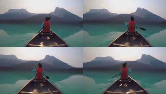 一名女子在湖中划船高清在线视频素材下载
