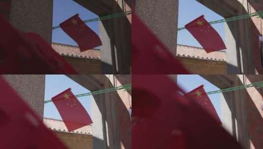 梧林古村落飘扬的五星红旗高清在线视频素材下载