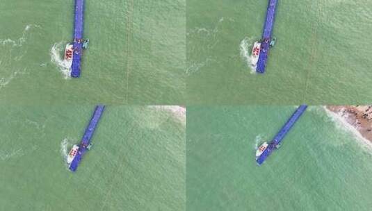 航拍连云港连岛风景区海滩上游船快艇码头高清在线视频素材下载