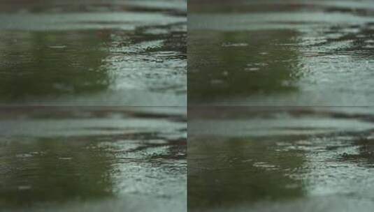 阴天下雨水滴马路积水倒影高清在线视频素材下载
